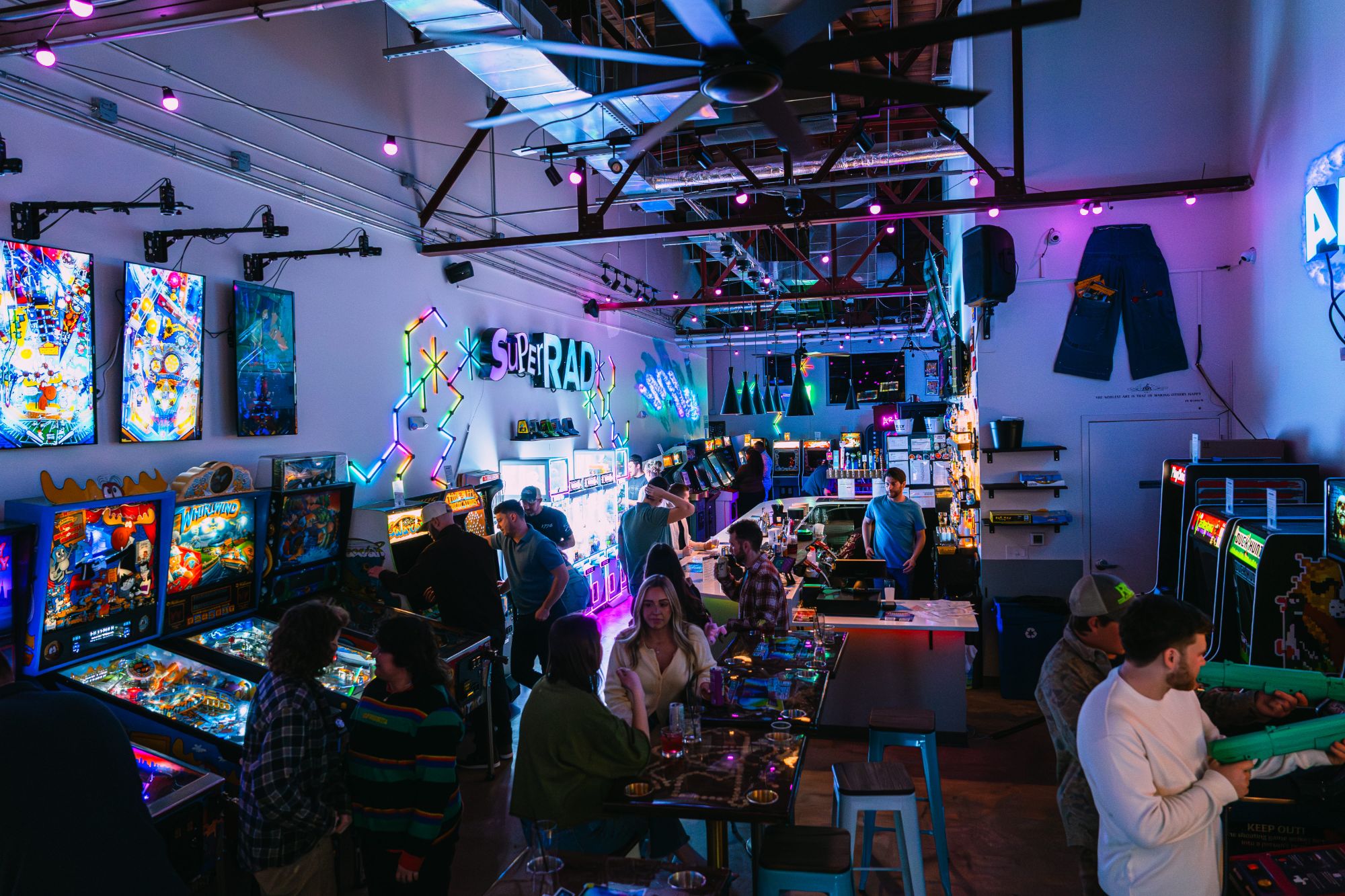 Busy night at Super Rad Retro Lounge arcade bar in Raleigh