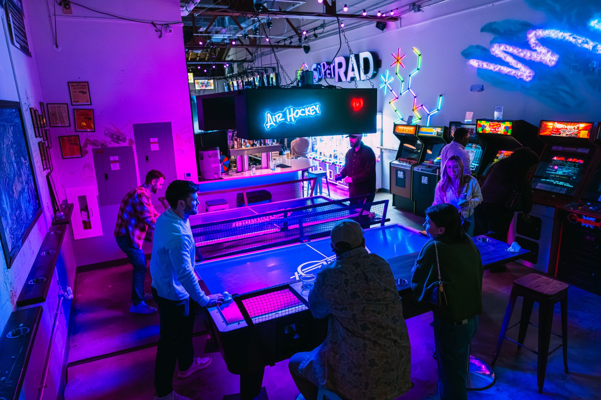 Air hockey tournament at Super Rad arcade bar Raleigh