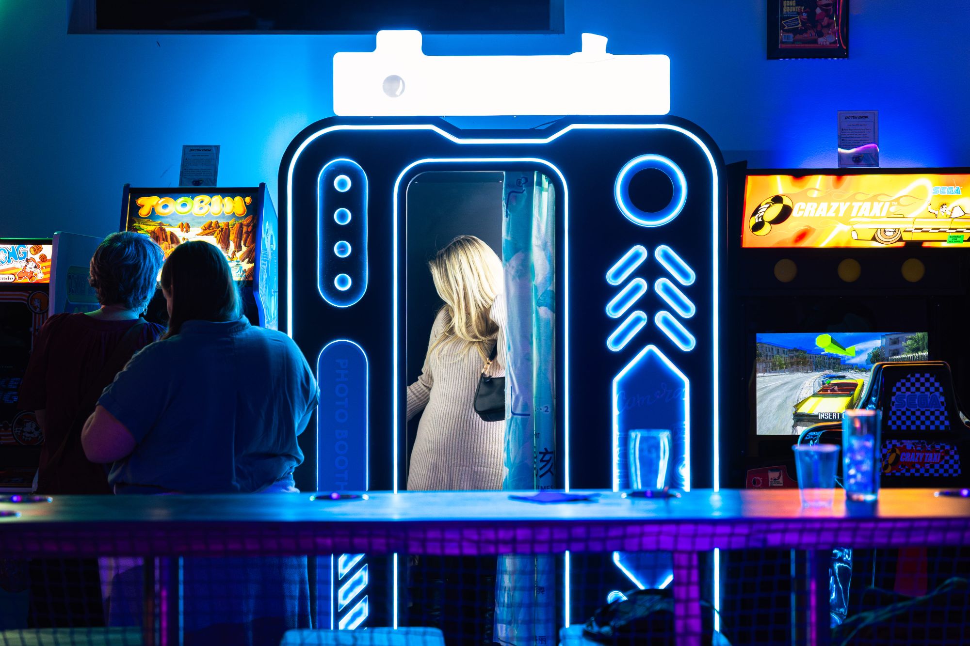 Competitive air hockey tournament at Super Rad Raleigh