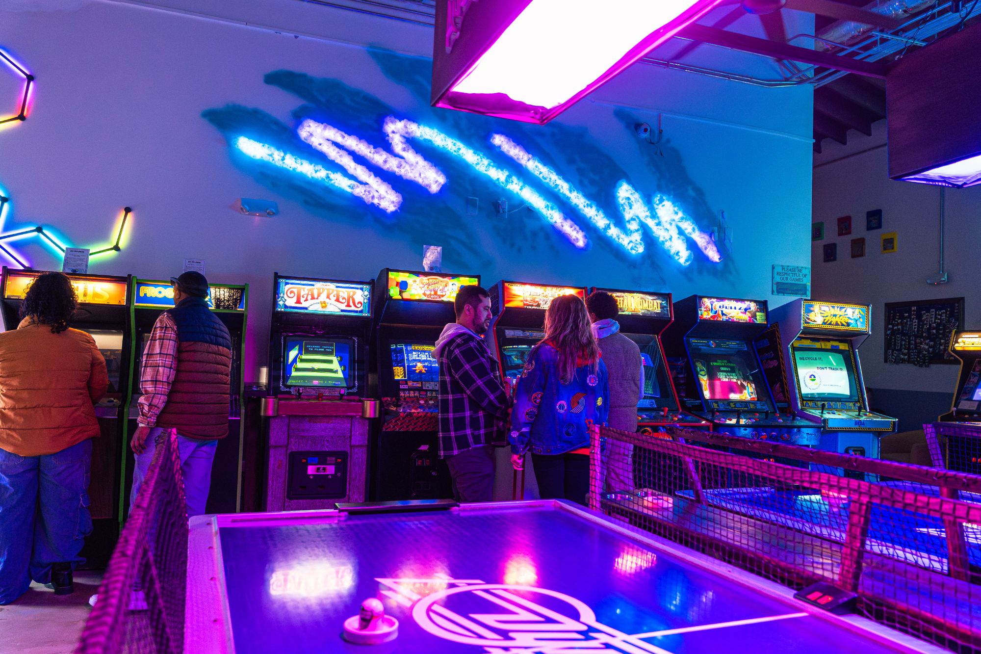 Air hockey at Super Rad arcade bar in Raleigh NC
