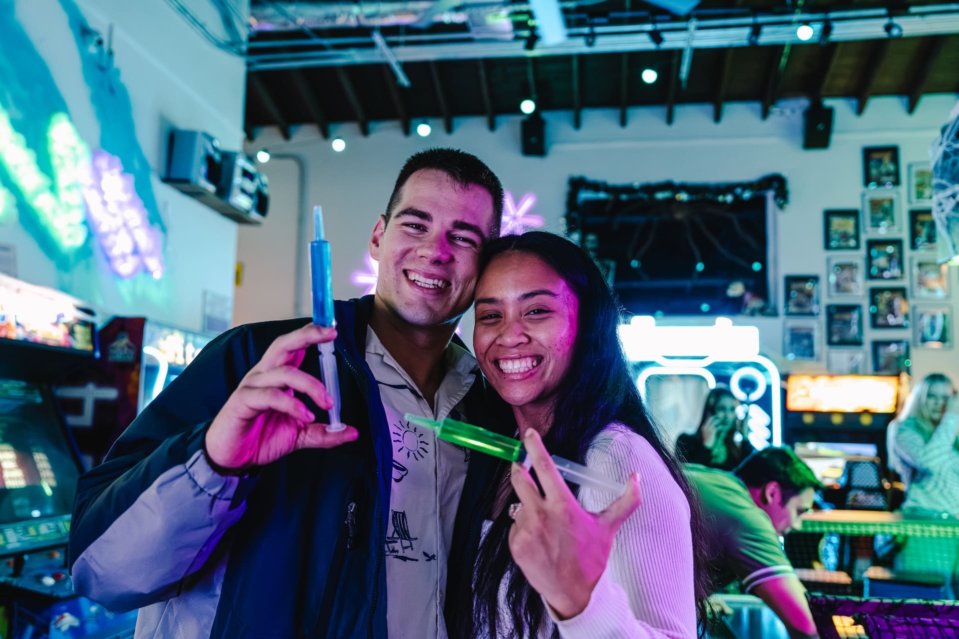 Couple having fun on a night out at Super Rad Retro Lounge Raleigh